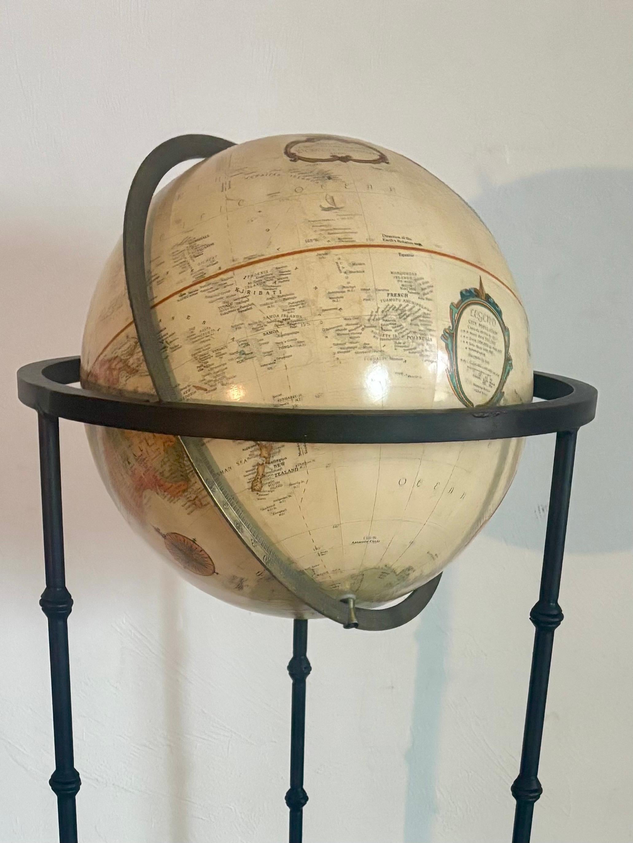 Vintage Globe with Wrought Iron Stand In Good Condition For Sale In Boynton Beach, FL