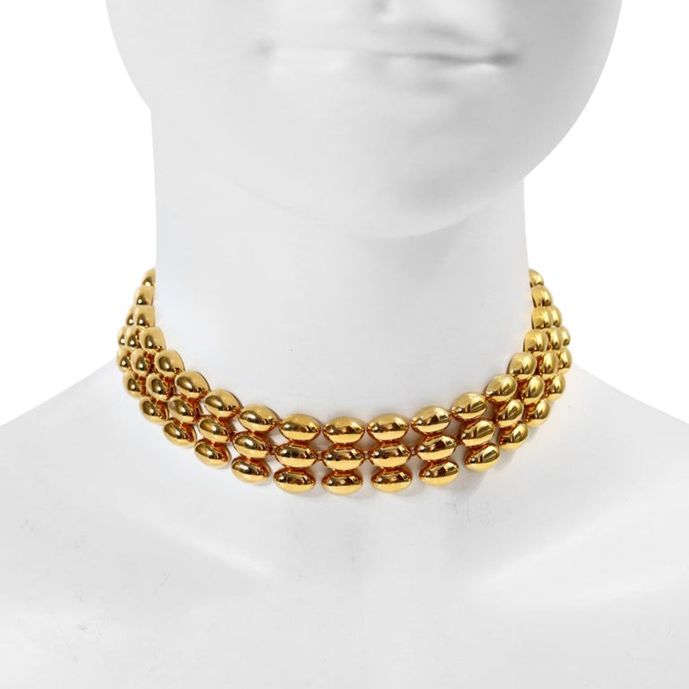 Vintage Gold 3 Row Connected Choker Circa 1990s. This is a great necklace to have in your arsenal and will always look great.  It is a choker that is not too wide so will be comfortable to wear but elevate your outfit.  It is well made with the