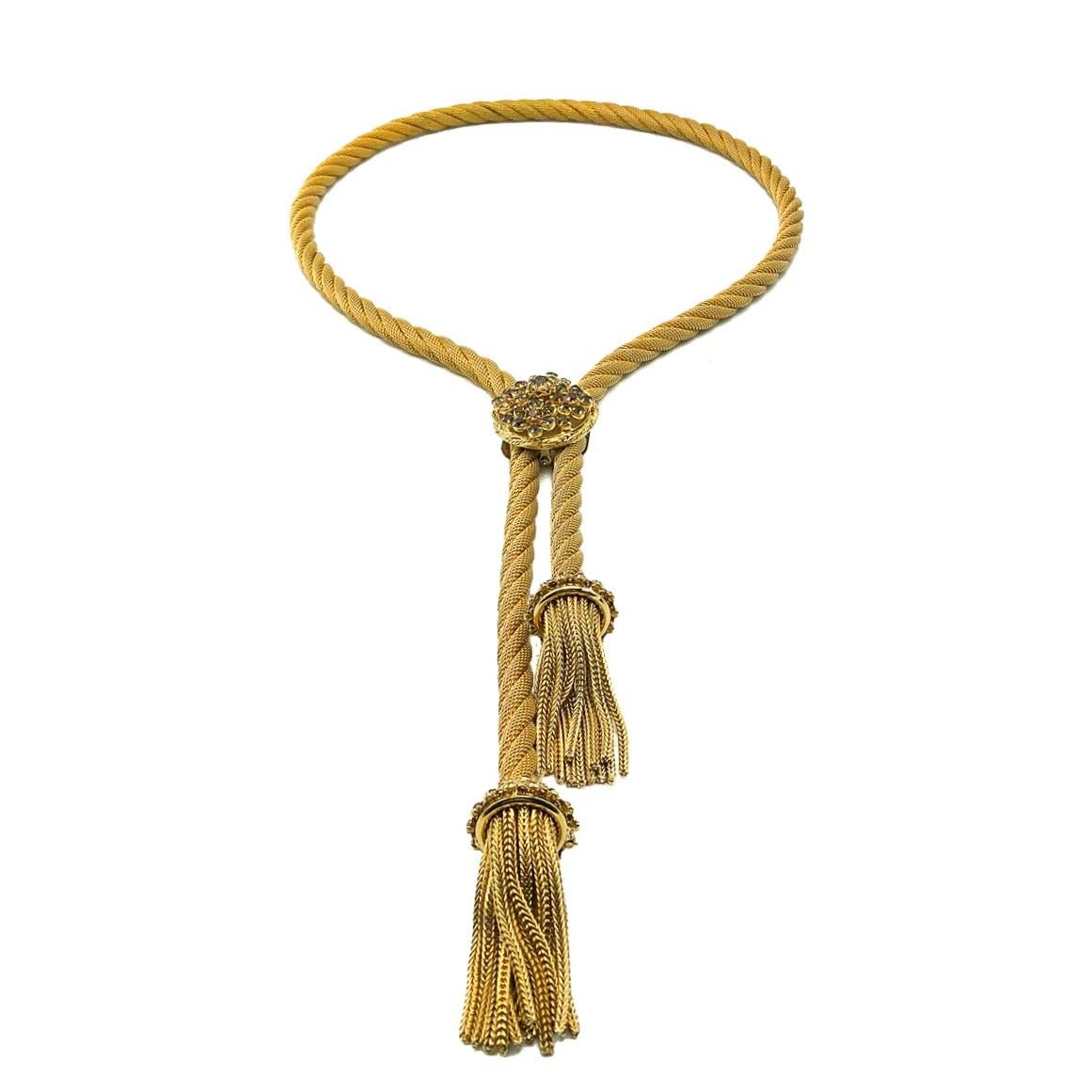 A truly stunning Vintage Lariat Tassel Necklace. Crafted in gold plated metal mesh with claw set amber crystals in filigree settings on the clasp and ends. Finished with beautiful, luxurious, chain style tassels. Super high quality. In very good