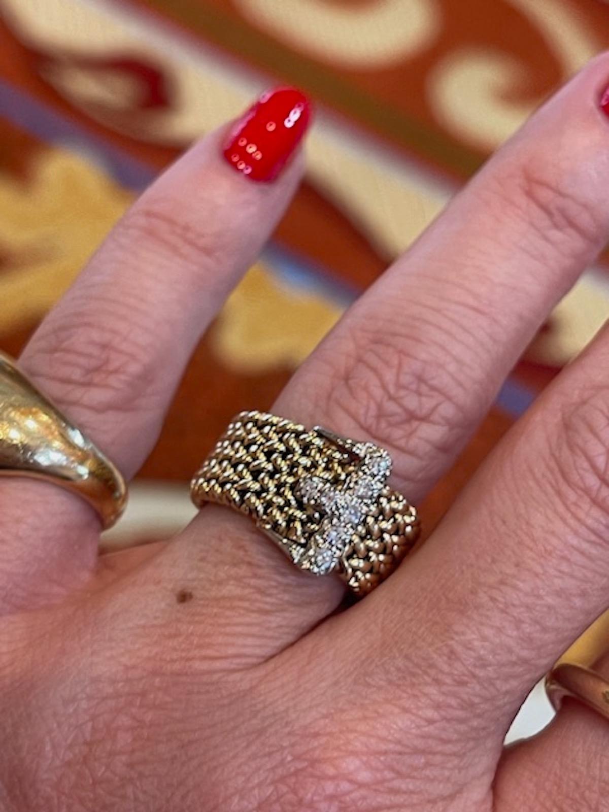 Stunning and chic vintage mesh buckle ring. 
The 14k gold mesh is thick and slinky and substantial while the diamond buckle truly sparkles. This is without question the most stunning buckle ring that we have seen. 
A fabulous ring for everyday or