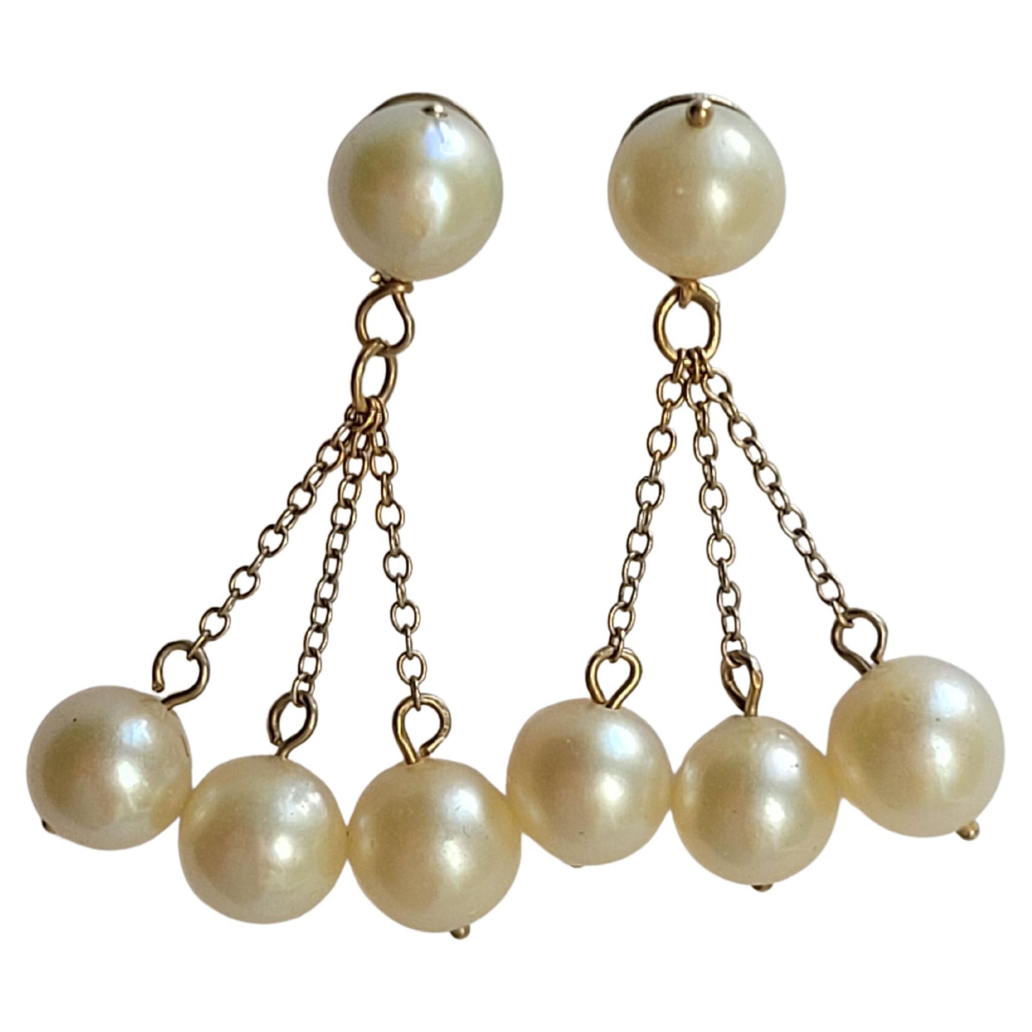 Boucles d'oreilles pendantes vintage en or et perles en vente