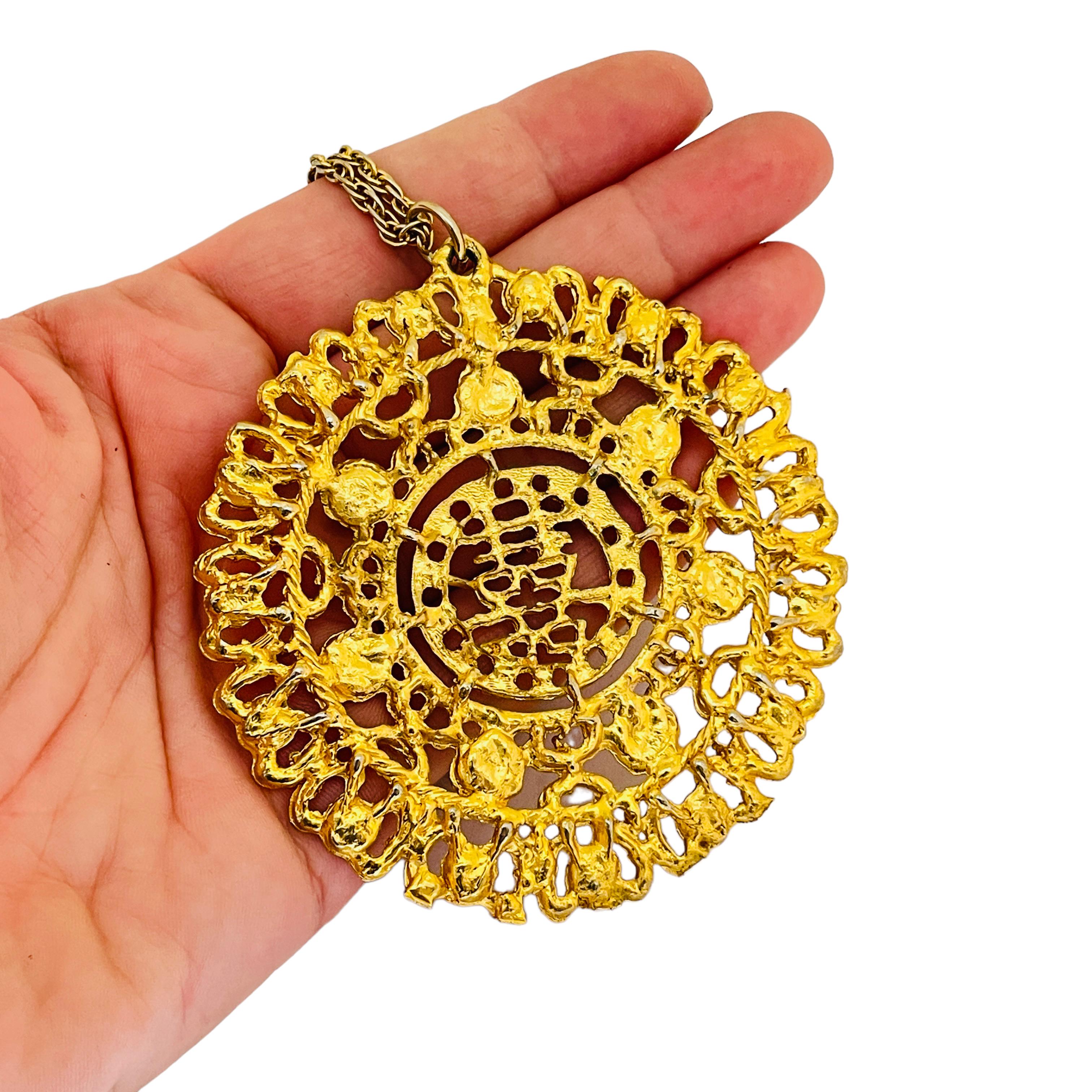 asian gold pendant