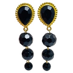 Boucles d'oreilles vintage en verre noir doré avec clip de créateur