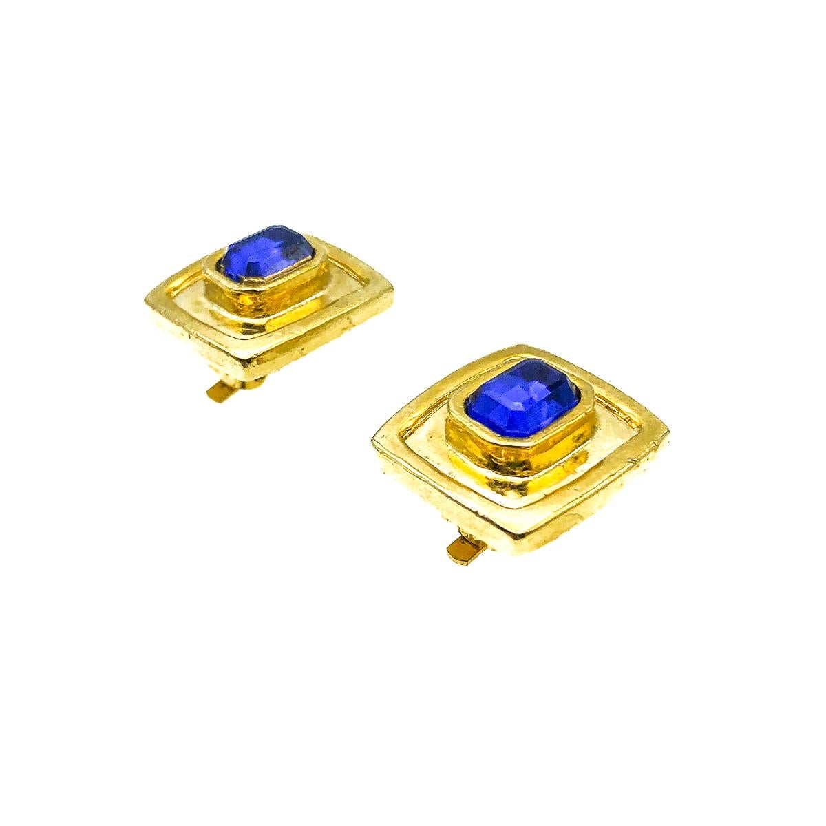 Vintage Blue Glass Earrings. Featuring very high quality, weighty geo style mounts set with a emerald cut style glass stone in glorous electric blue. Crafted in gold plated metal. In very good vintage condition, signed, 1.6cms. A very chic pair of