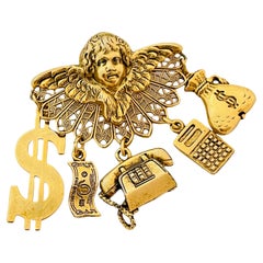 Vintage gold cherub angel money office charm brooch