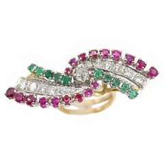Anillo de cóctel vintage dorado con un rubí de 3,85 ct, una esmeralda y un diamante de 0,35 ct