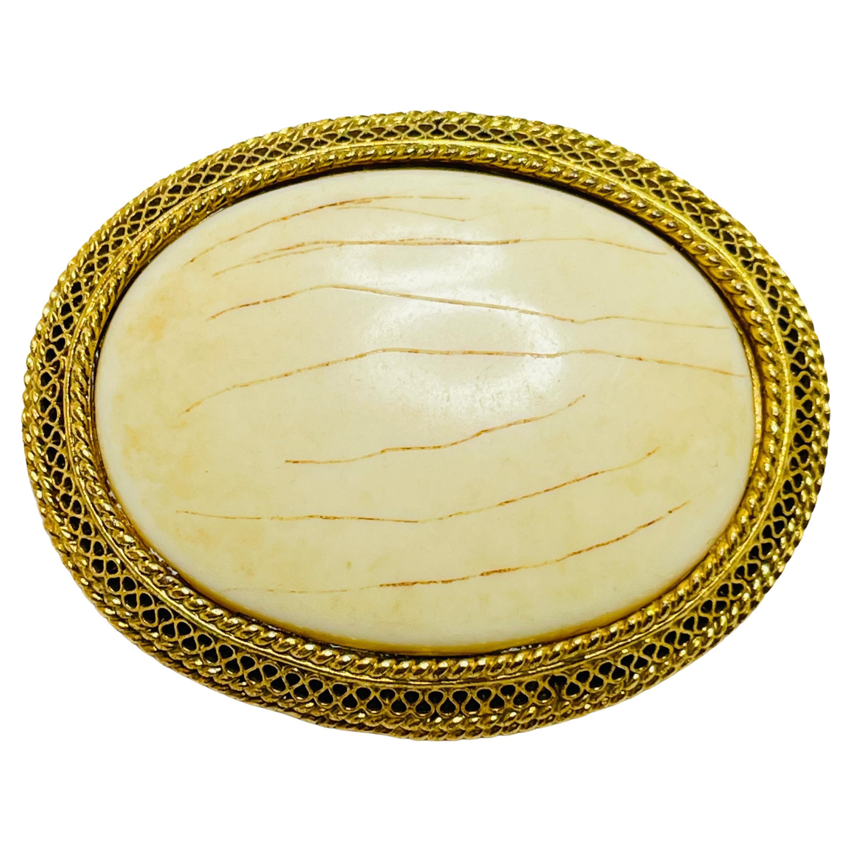 Vintage gold cream designer brooch For Sale