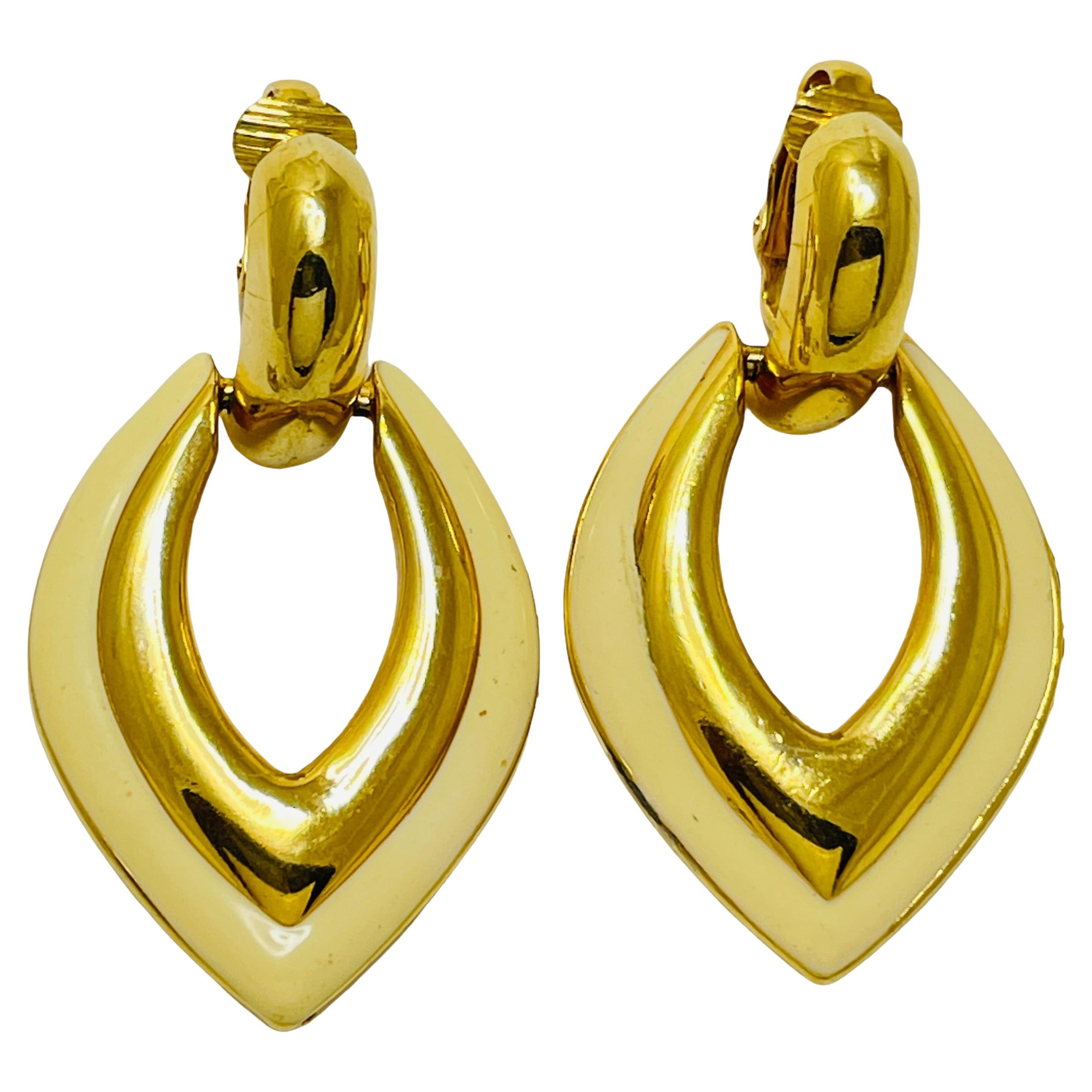 Vintage gold cream enamel dangle designer clip on earrings For Sale