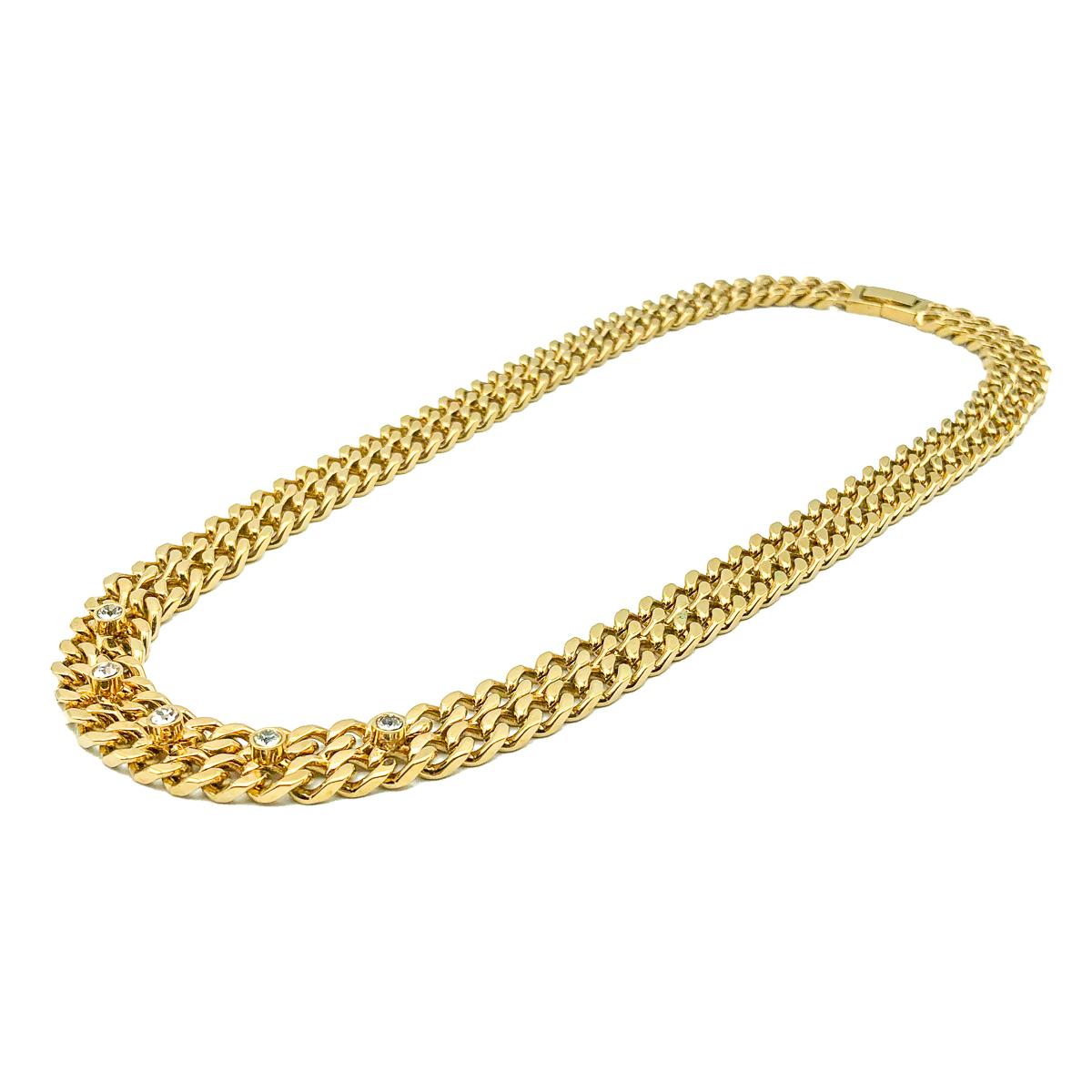A Vintage Crystal Chain Necklace. Featuring a gold plated double flattened curb chain with bezel set crystal accents. In very good vintage condition, approx. 44.5cm. A stunning capsule necklace that will work with everything and always look
