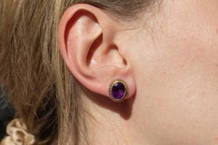 Vintage gold earrings with amethysts, Great Britain, mid 20th century