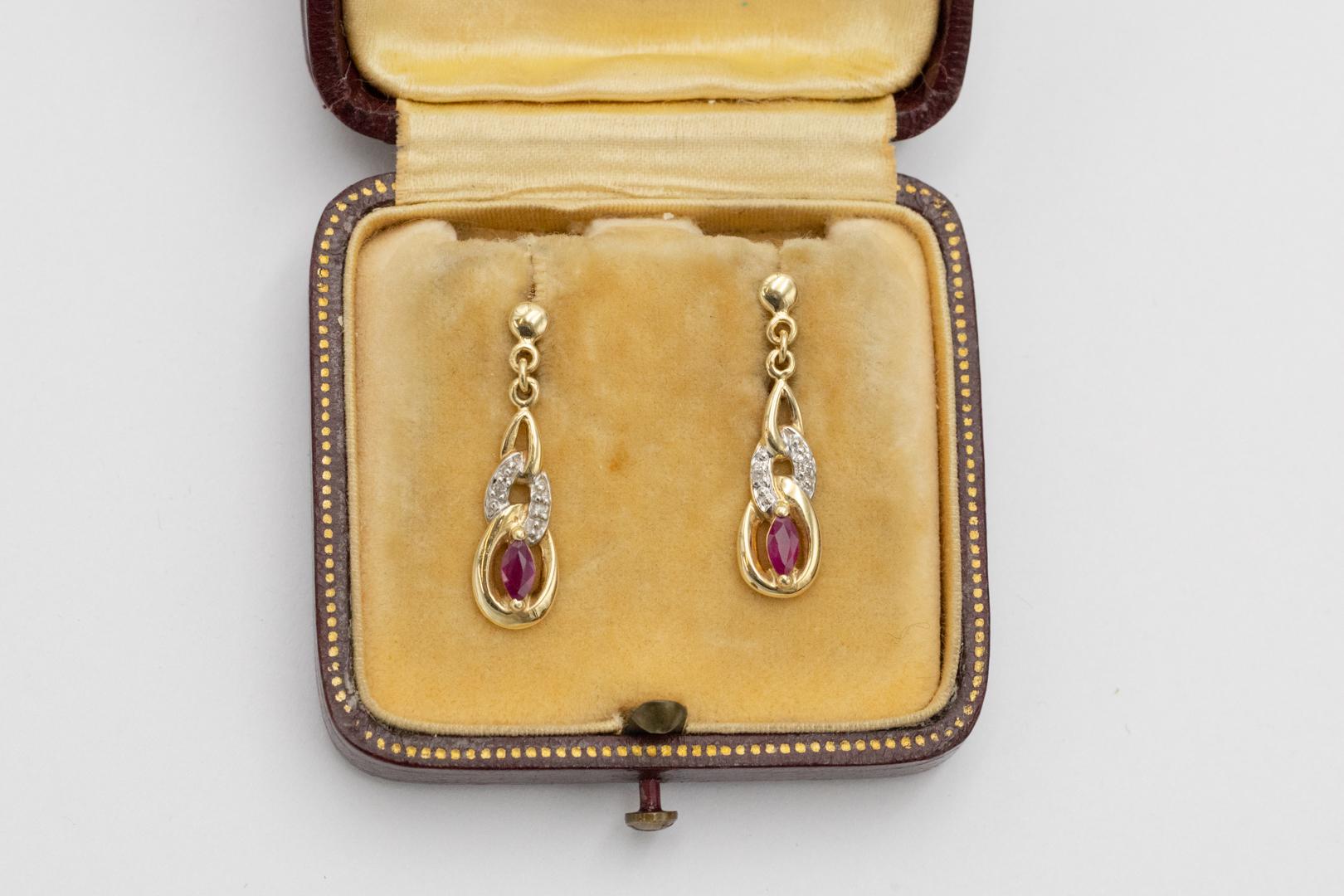 Pendientes vintage de oro con rubíes y diamantes. Corte marquesa en venta