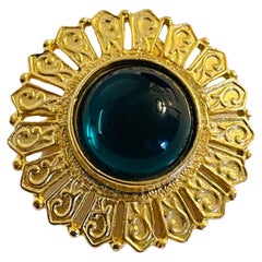 Vintage gold emerald glass designer runway brooch