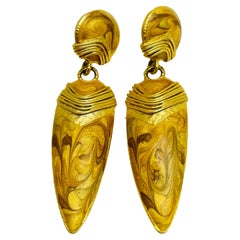 Vintage gold enamel designer clip on earrings