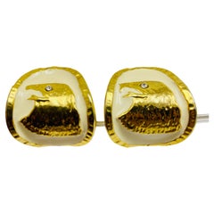 Boucles d'oreilles clip vintage en émail doré avec aigle de designer 