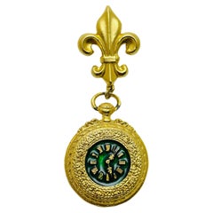 Vintage gold enamel fleur de lis dangle clock designer brooch