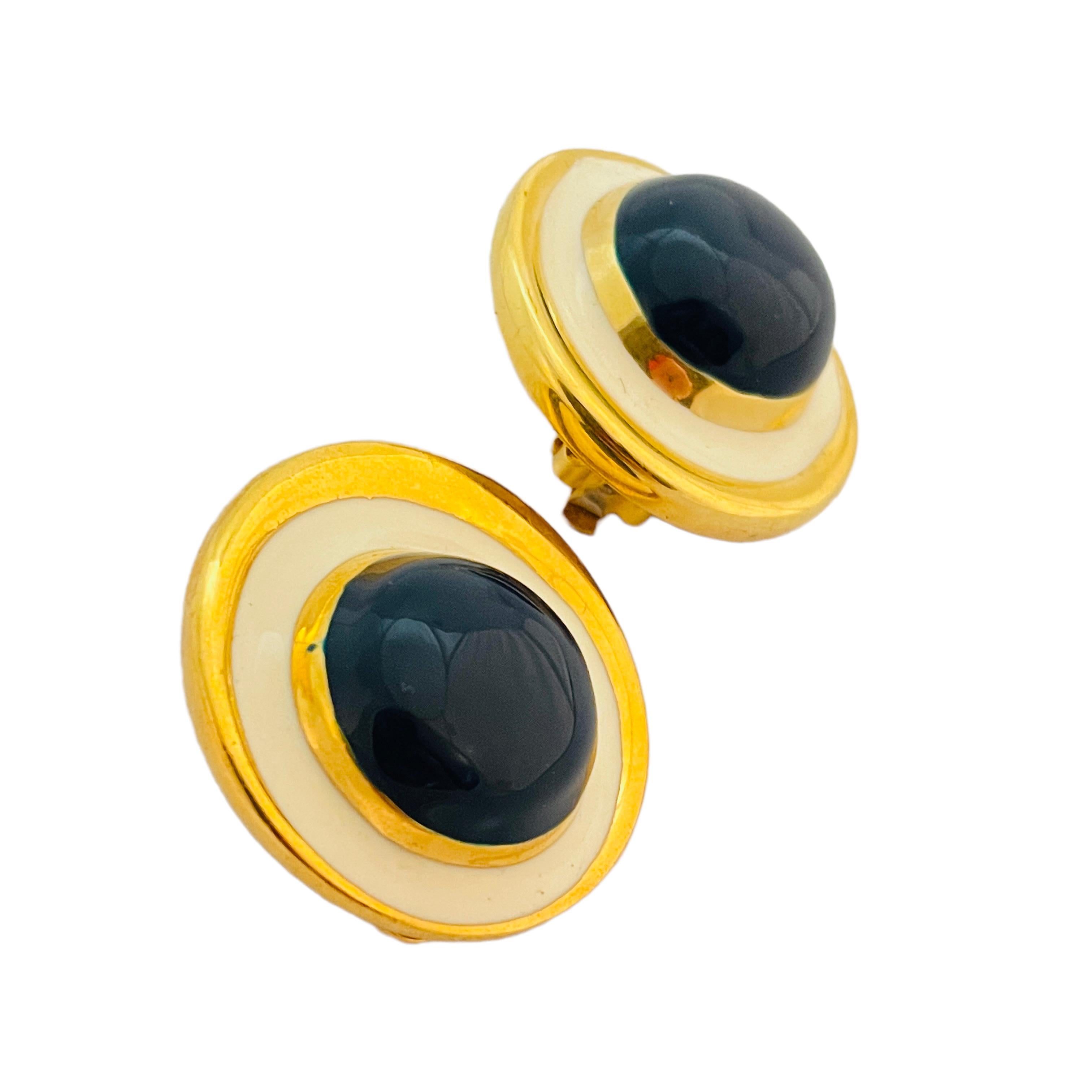 DETAILS

• unsigned

• gold tone with enamel

• vintage designer clip on earrings

MEASUREMENTS

• 1.25
