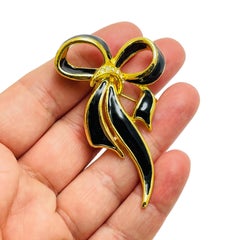 Vintage gold enamel rhinestone bow brooch
