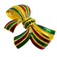 Spilla vintage da passerella con fiocco di strass e smalto dorato