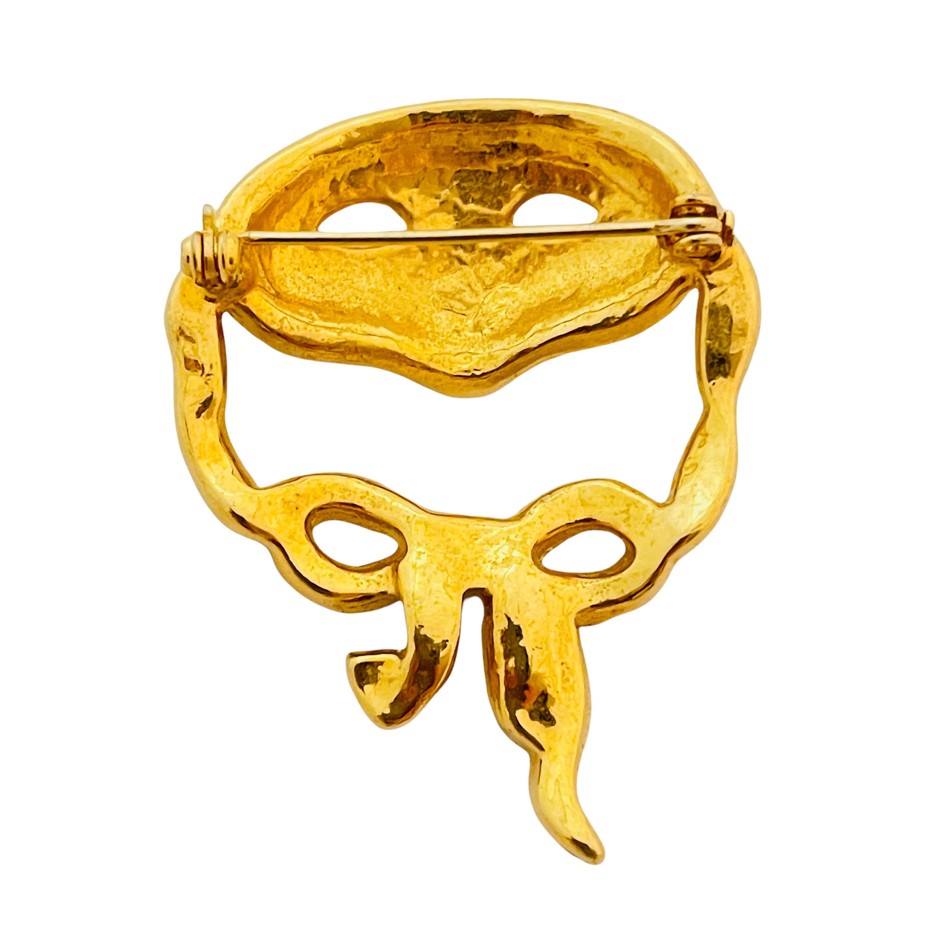 Vintage gold enamel rhinestone mask designer runway brooch In Good Condition In Palos Hills, IL