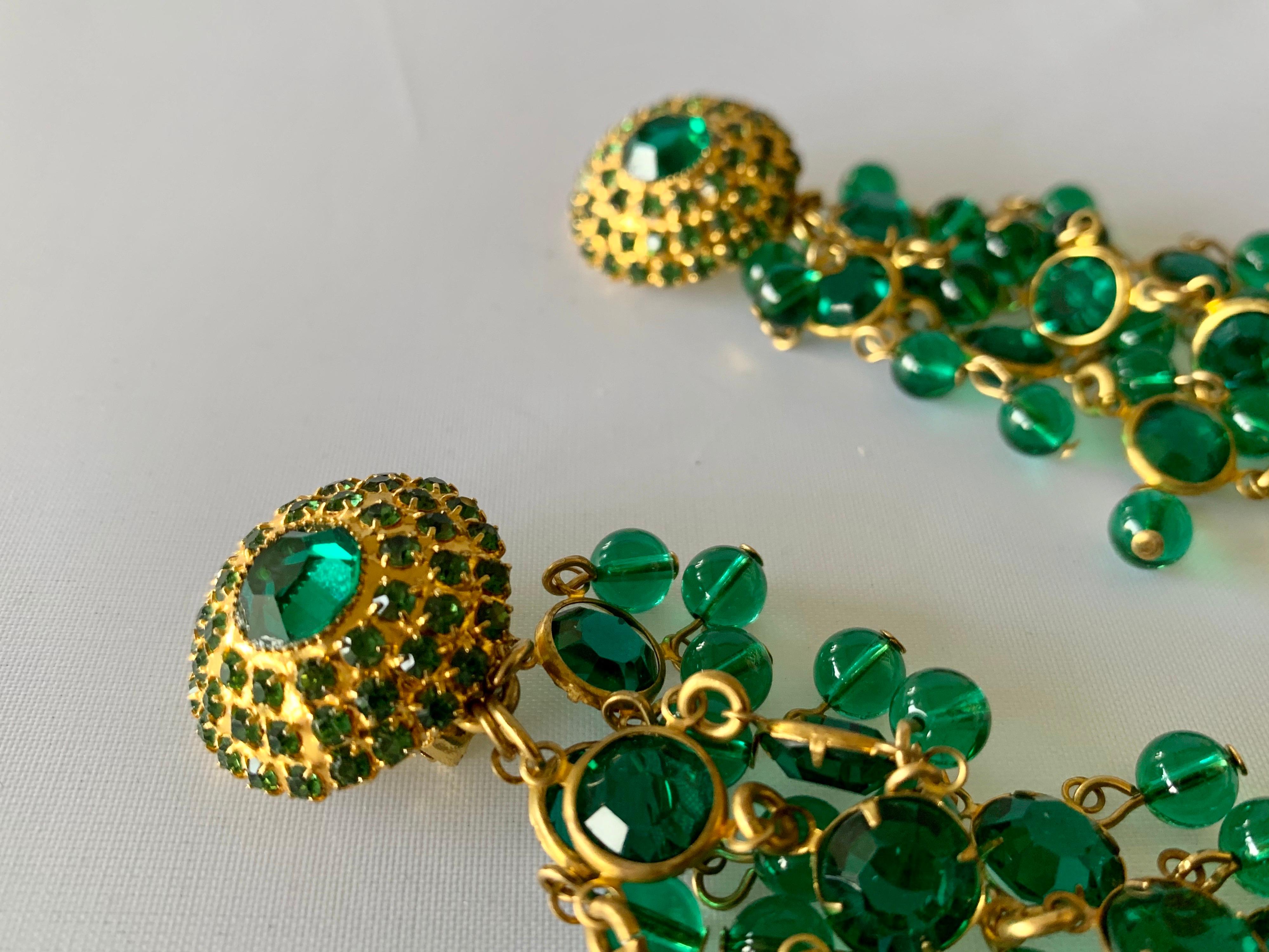 gold and emerald statement earrings