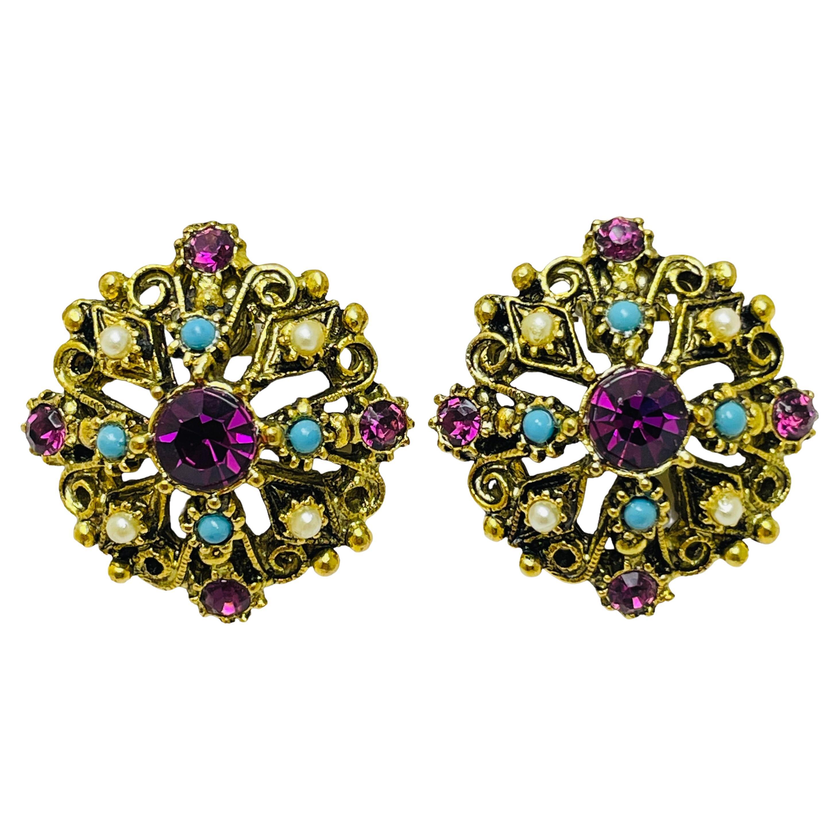 Orecchini a clip con gemme finte d'oro d'epoca, firmati dalla moda