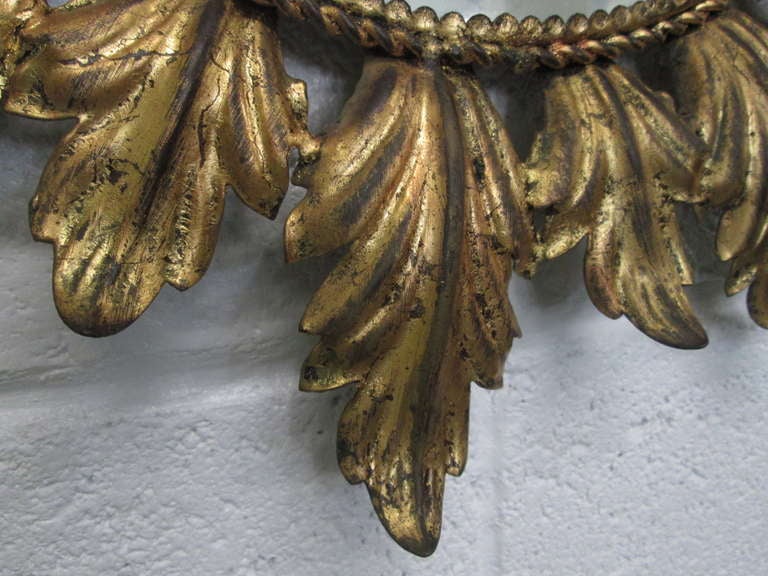 Vintage Gold vergoldet Sonnenschliff Spiegel. Hollywood-Regency-Stil.
Gesamtmaße: 21,5