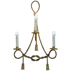 Aplique de pared vintage dorado de cuerda retorcida y borla de tres brazos con soportes para velas