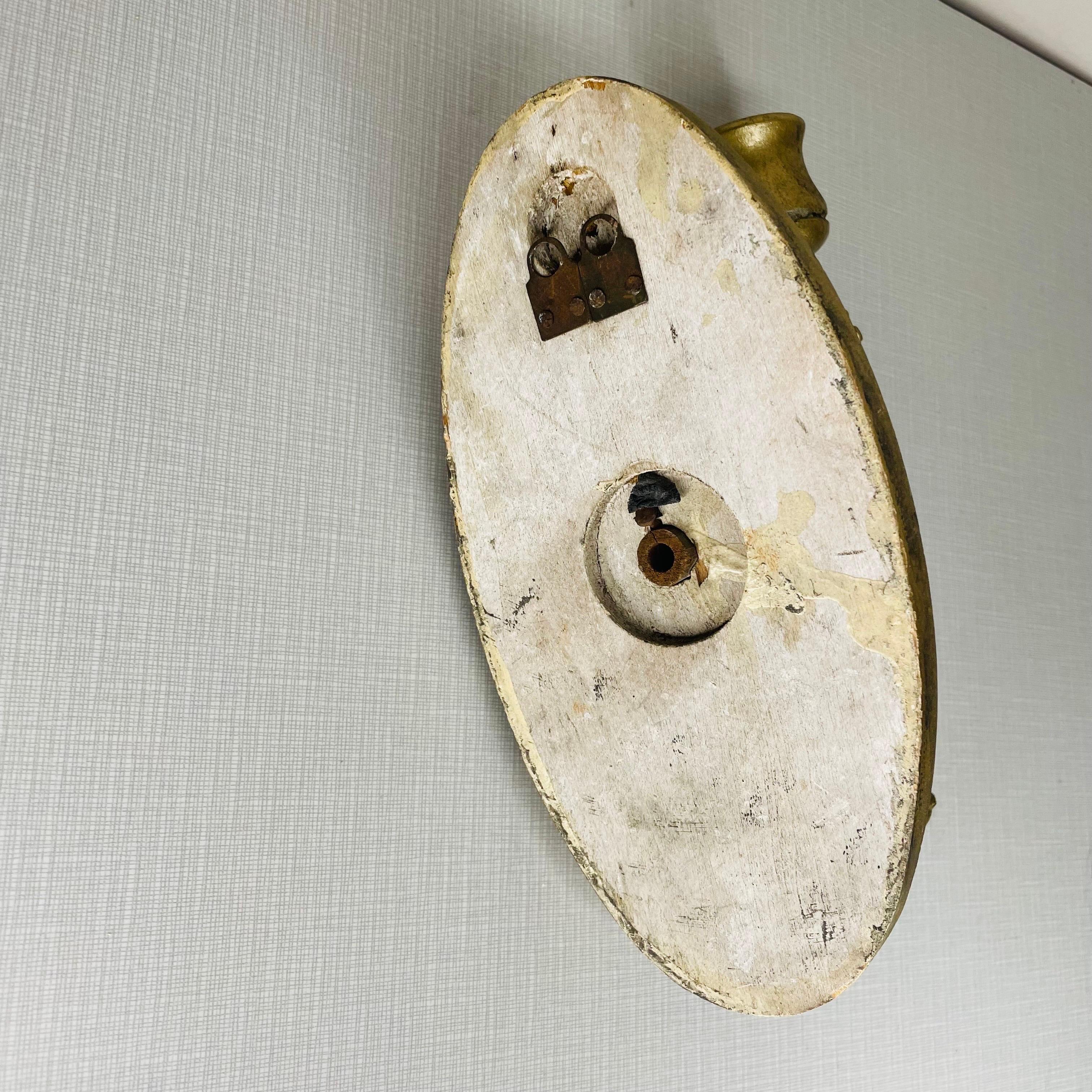 Einzelarmige Kerzenleuchter aus Gold und vergoldetem Holz, ein Paar (20. Jahrhundert) im Angebot