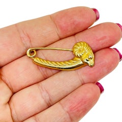 Vintage gold gold tone rams head brooch