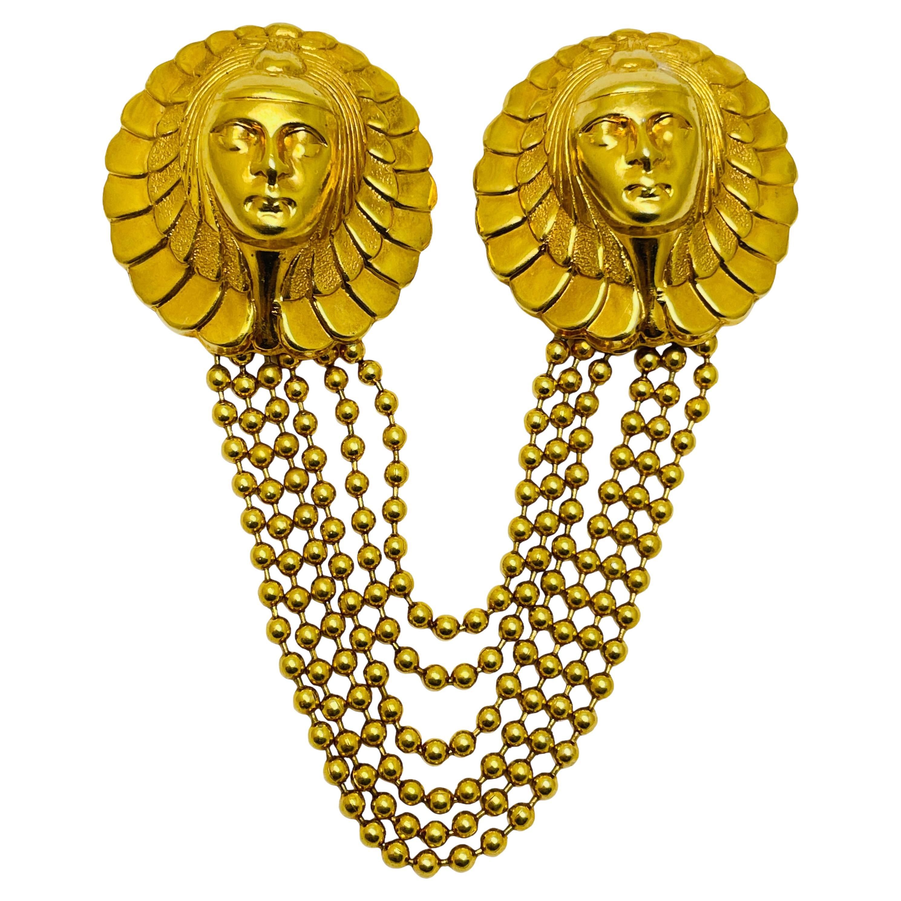 Vintage gold indian head double designer brooch For Sale