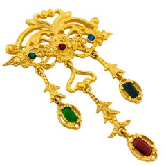 Vintage gold jewel rhinestone dangle designer runway brooch