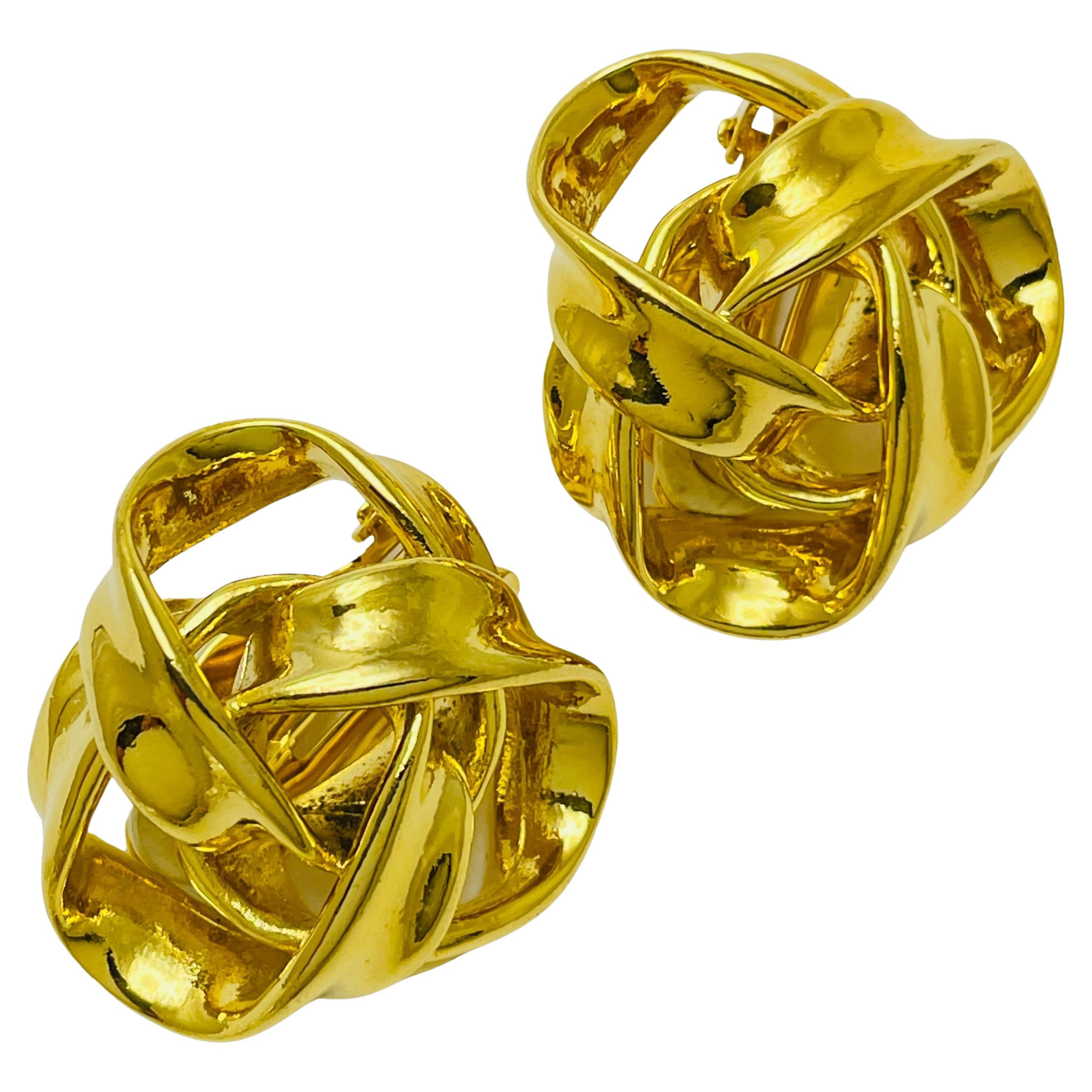 Vintage gold knot designer runway clip on earrings For Sale