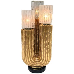 Vieille lampe cactus avec feuilles d'or