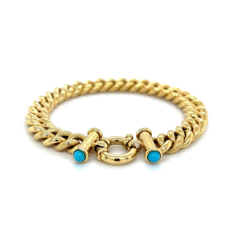 Simply Beautiful! High Quality Deluxe 9.20mm Curb Link Gold Bracelet with Turquoise set Toggle Clasp. Hand crafted in 14K Yellow Gold. Measuring approx. 7.25” long. More Beautiful in real time! A sure to be admired piece you’ll turn to time and