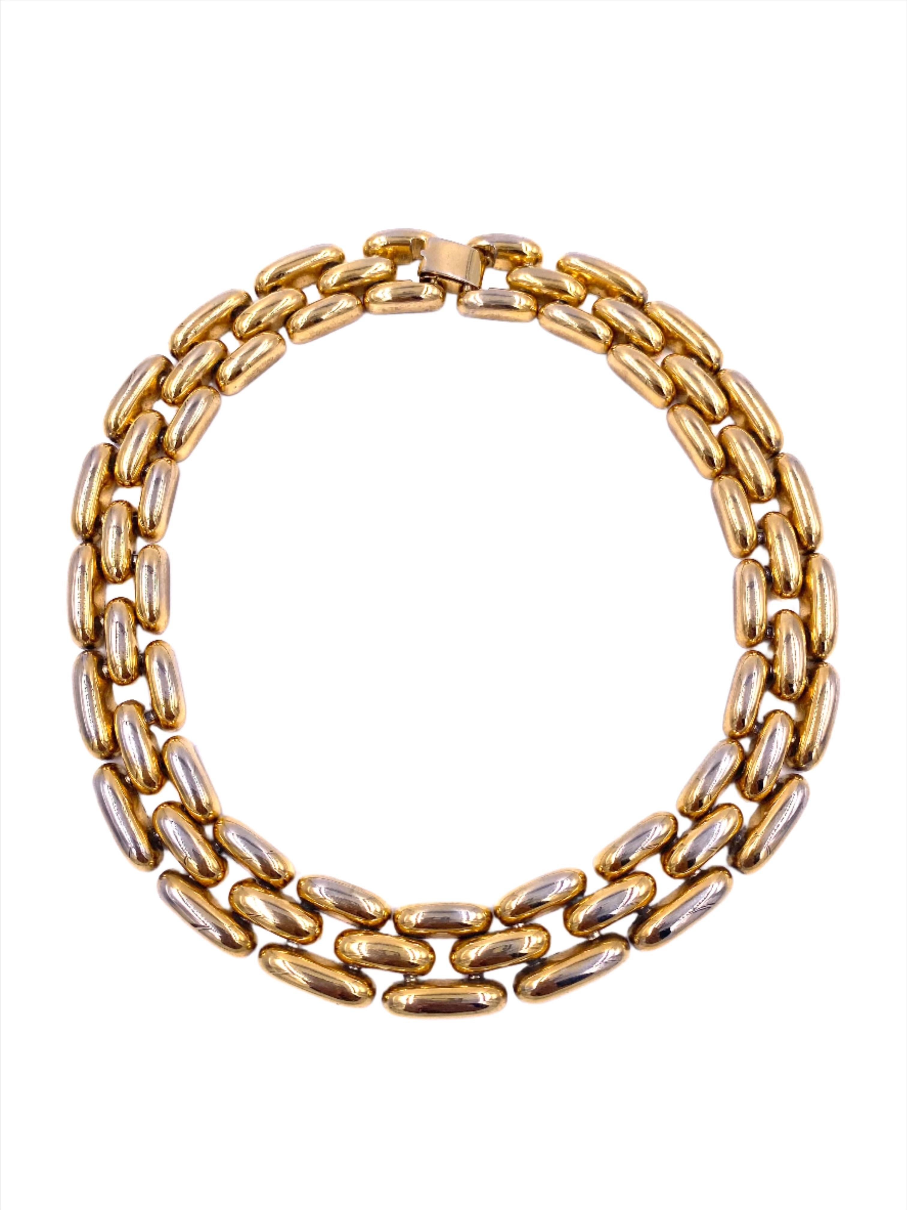 Indulge in luxury with our captivating Gold Necklace. Crafted with linked pieces, this necklace is 1