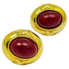 Boucles d'oreilles vintage de créateur en verre rouge marbré doré