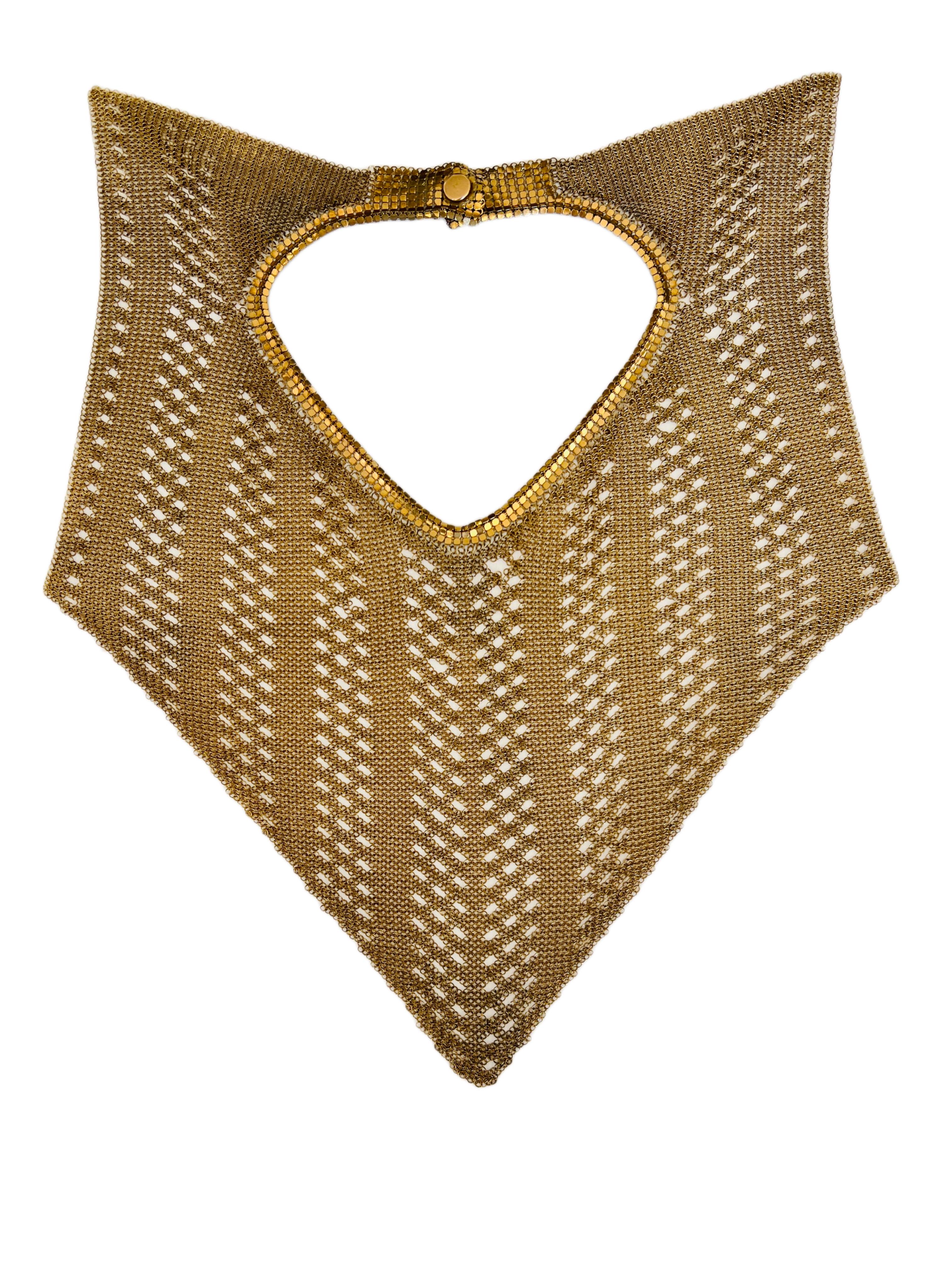 Fabulous and rare gold mesh necklace featuring an open chain maille that drapes nicely over the shoulders and décolletage. 

Size: Approximately 12.5