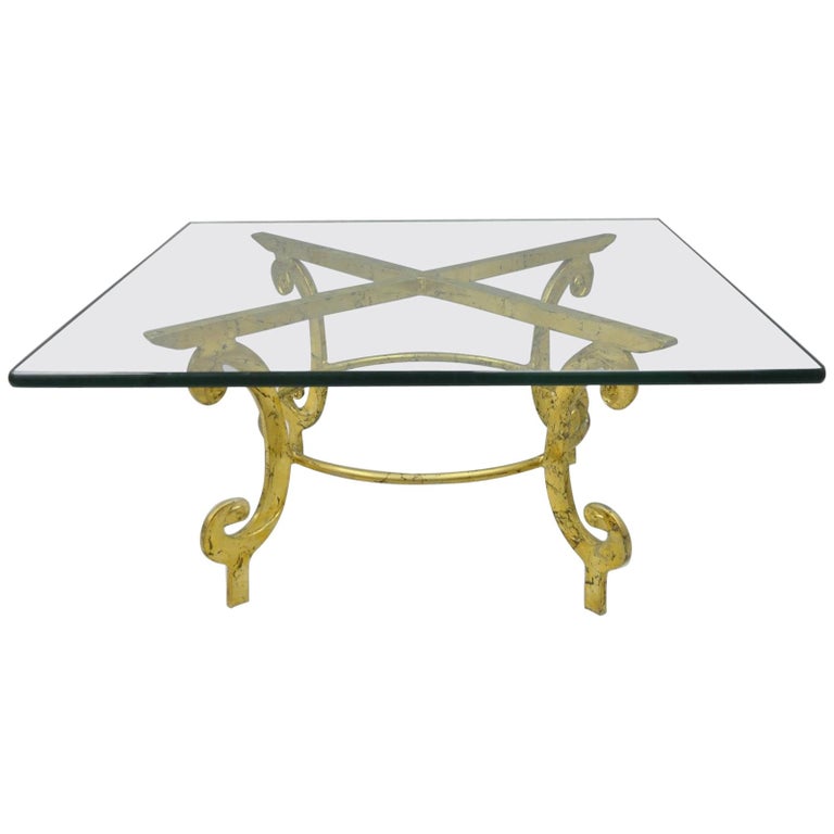Gold Glass Coffee Tables 358 For Sale On 1stdibs The glistening gold design under the glass instantly updates this end table and makes it look much more expensive than a $15 garage sale find. vintage gold metal and glass italian hollywood regency scrolling coffee table
