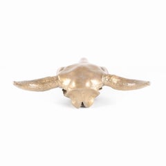 Goldfarbene Wandskulptur aus Metall