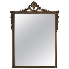 Miroir vintage doré avec détails floraux