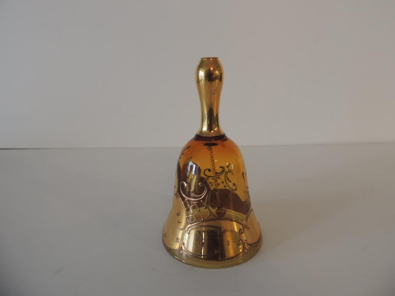 Vintage gold Murano glass table bell with hand painted flower.
Size: 3.5