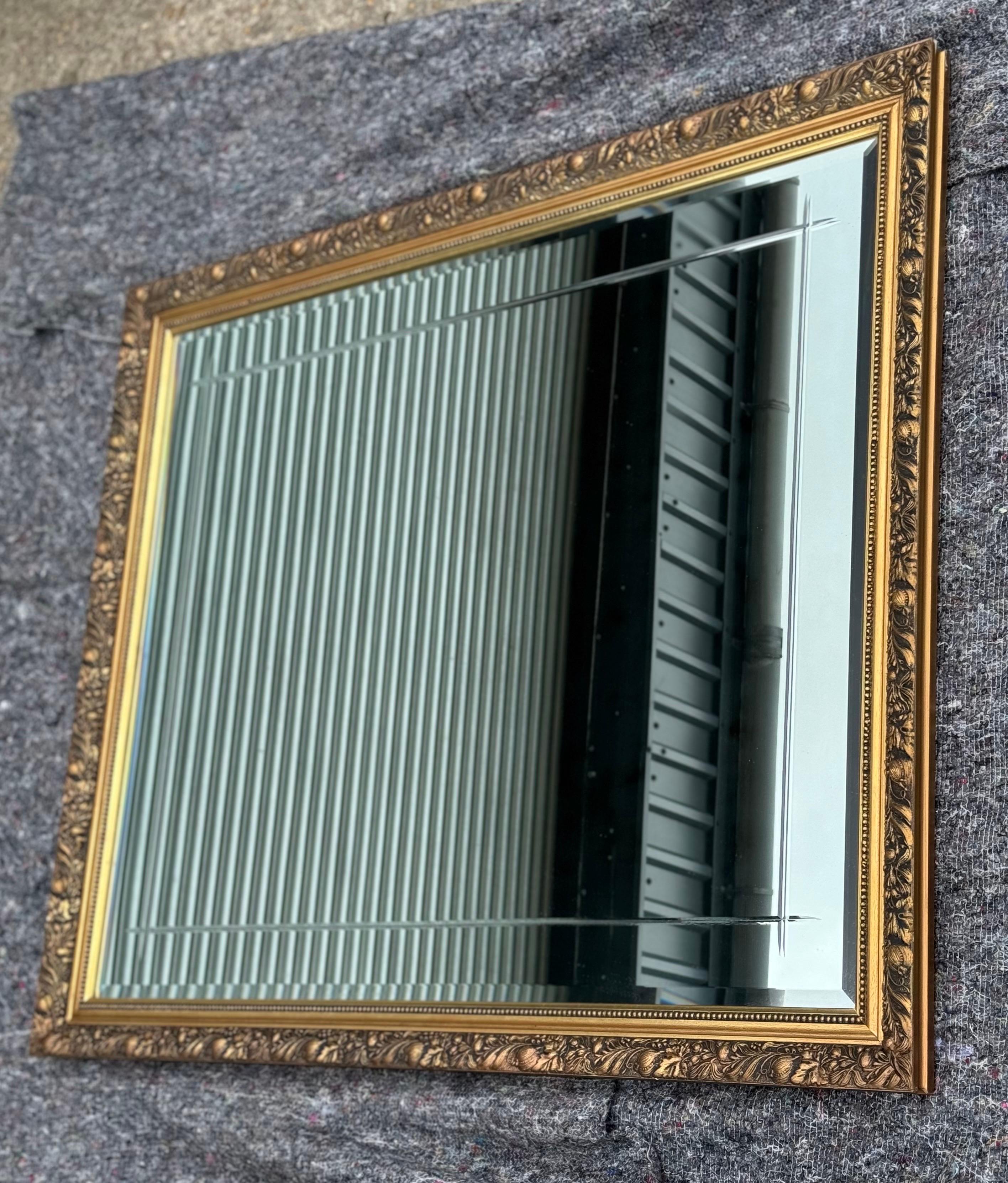 
We are delighted to offer for sale this Lovely Gold Ornate Bevelled Mirror. 

Please carefully examine the pictures to see the condition before purchasing, as they form part of the description. If you have any questions, please message us.