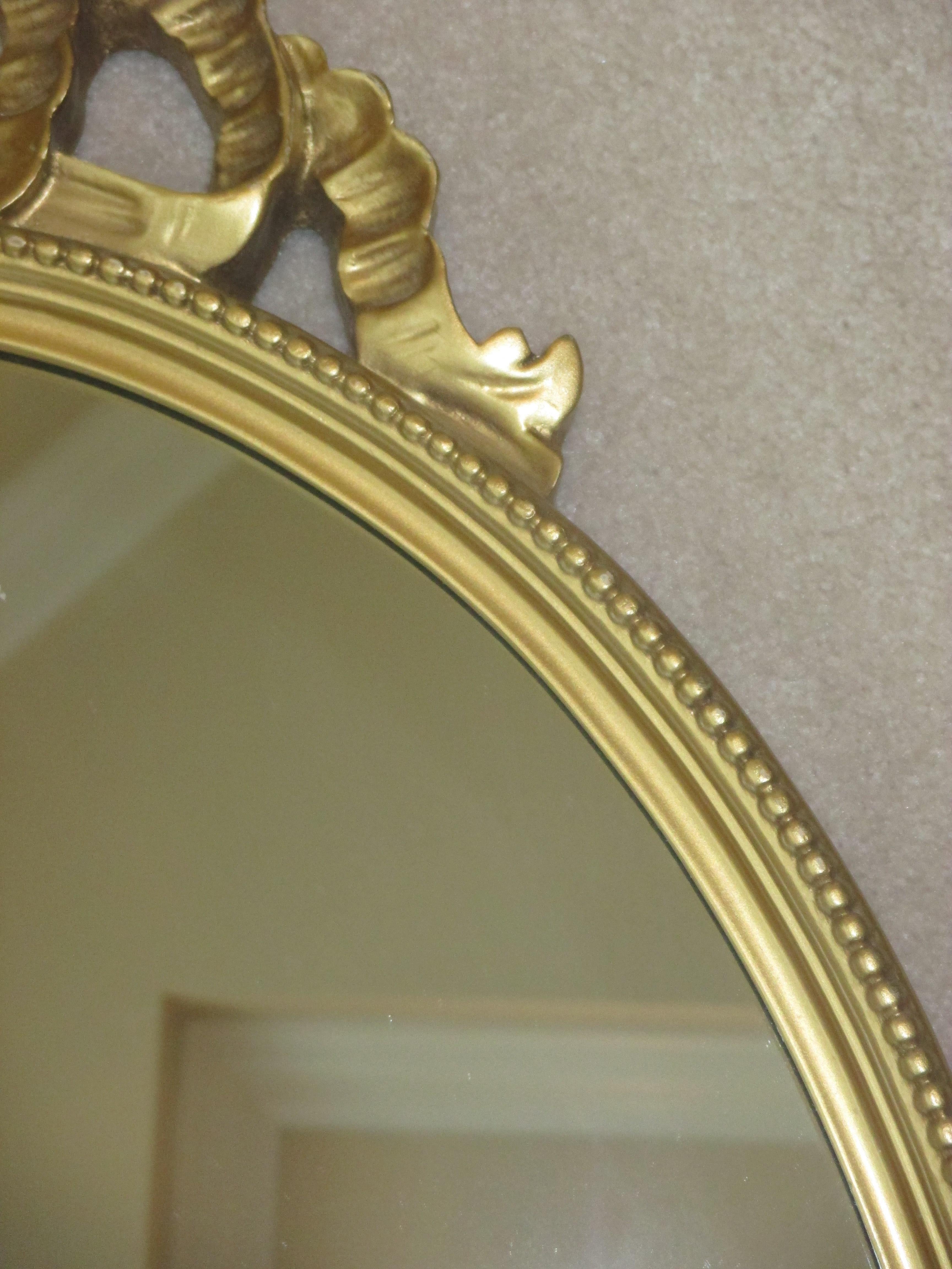 oblong gold mirror