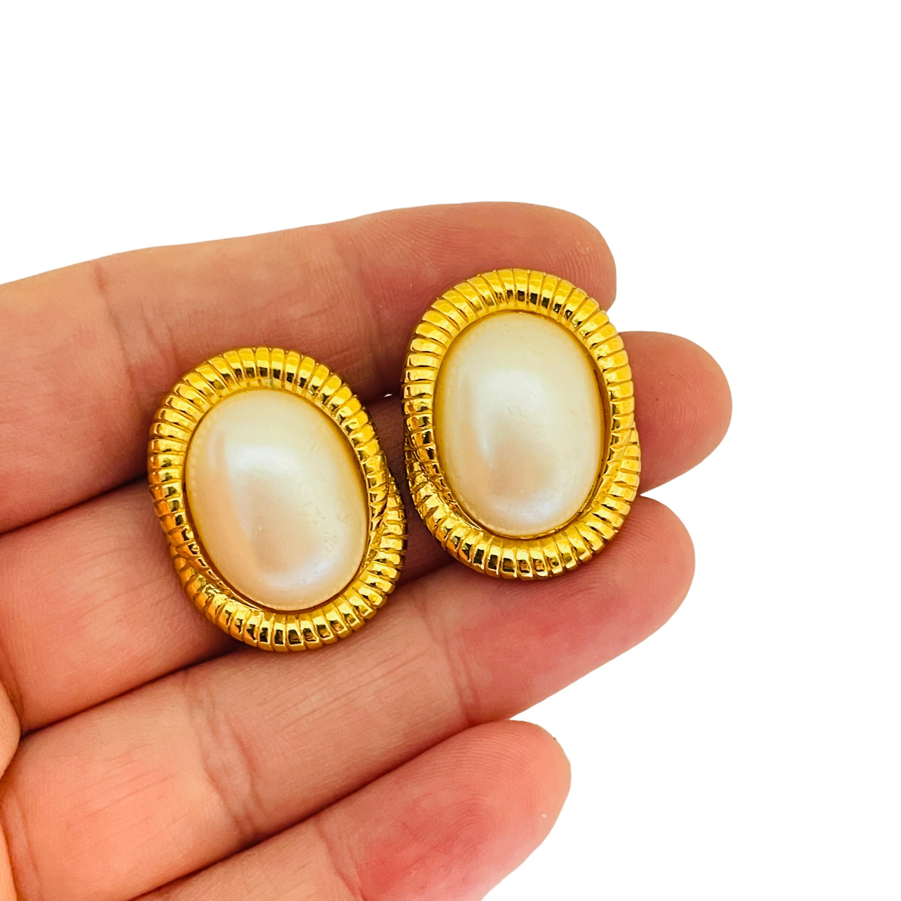 Women's or Men's Vintage gold pearl designer pierced earrings For Sale
