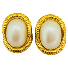 Vintage gold pearl designer pierced earrings