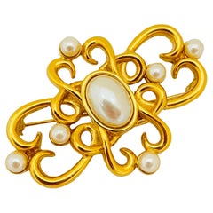 Vintage gold pearl designer runway brooch 