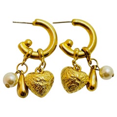 Vintage gold pearl heart pierced designer earrings