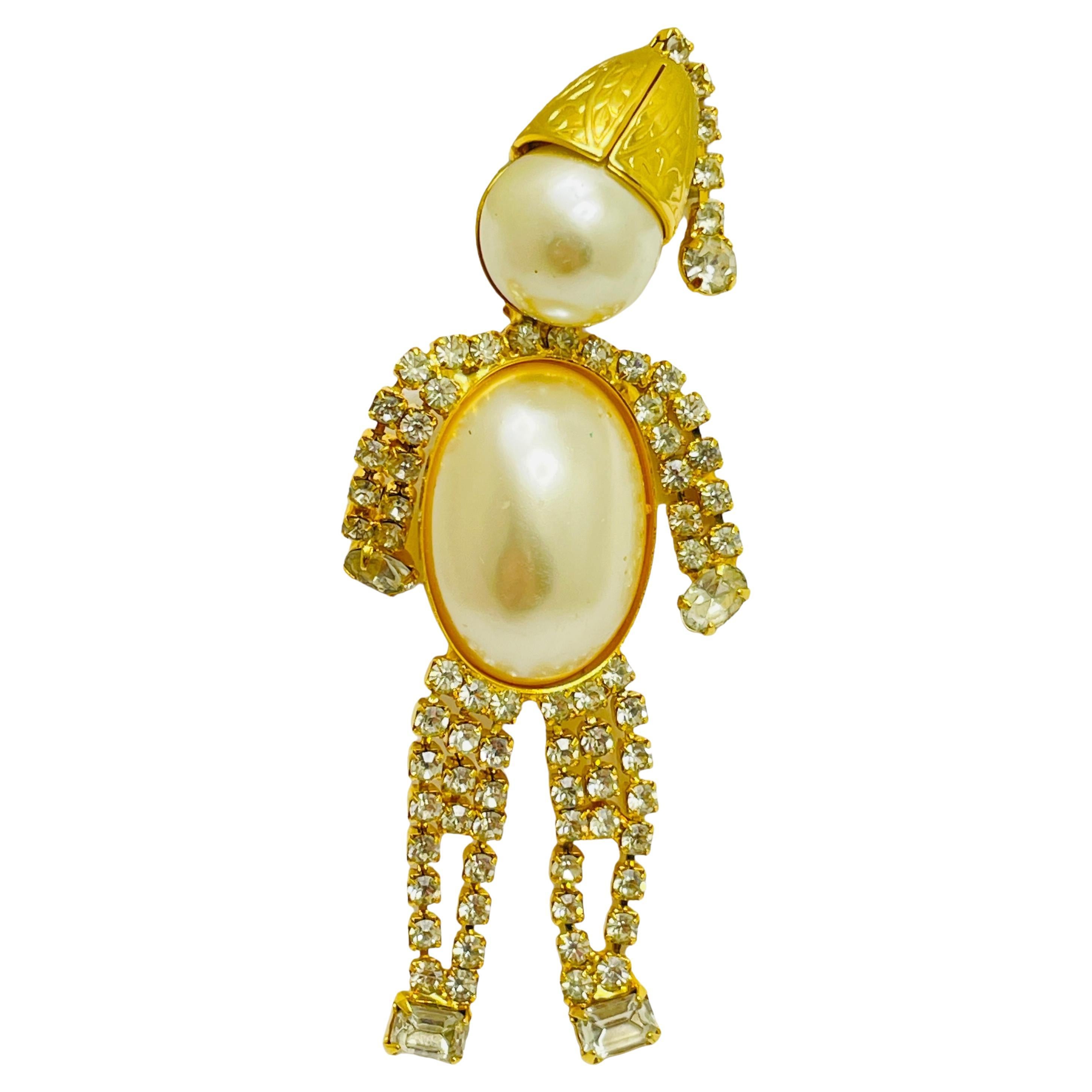 Spilla d'epoca con perle d'oro e strass, con figura di design