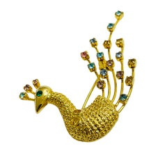 Vintage gold pink blue rhinestone peacock designer brooch