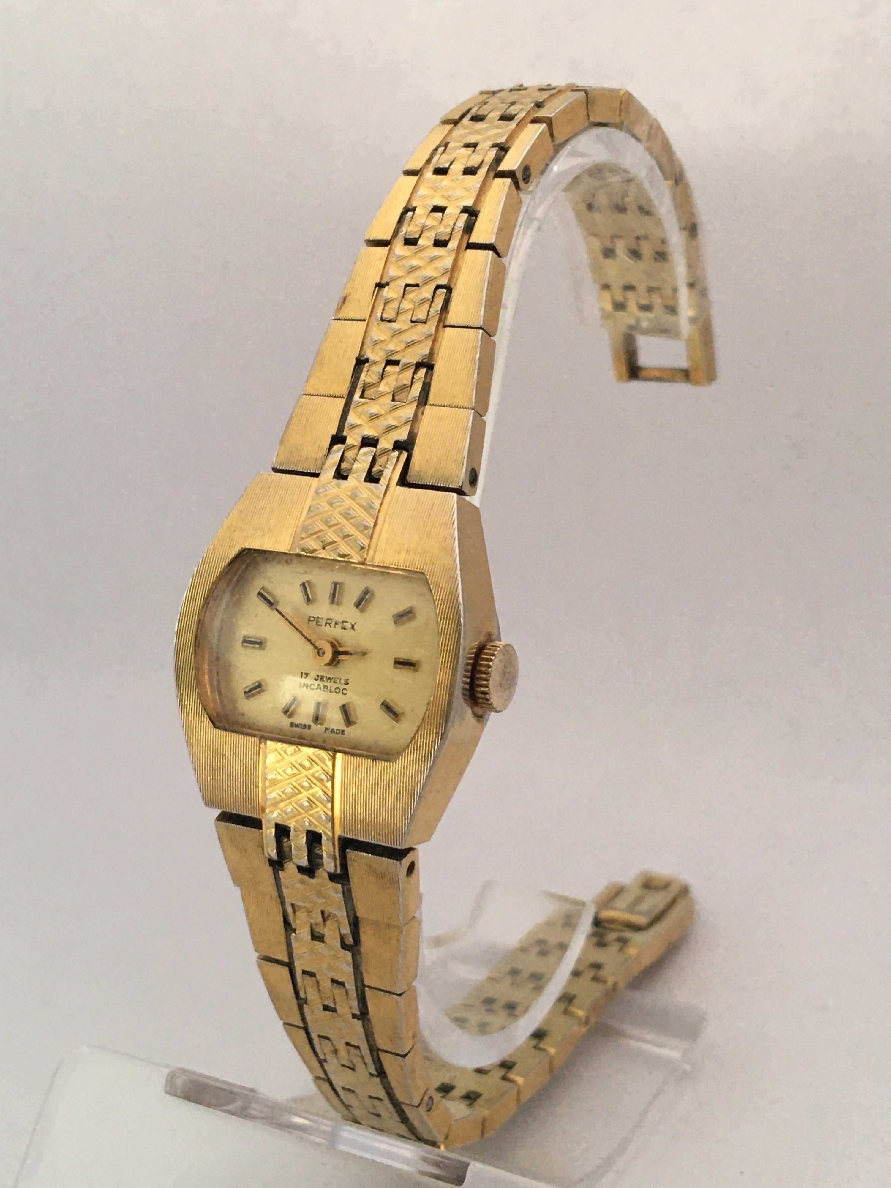 This beautiful vintage hand winding ladies watch is in good working condition and it is running well. Visible signs of ageing and wear with minor light scratches on the glass and tarnishes on the watch case and bracelet. Watch and bracelet is